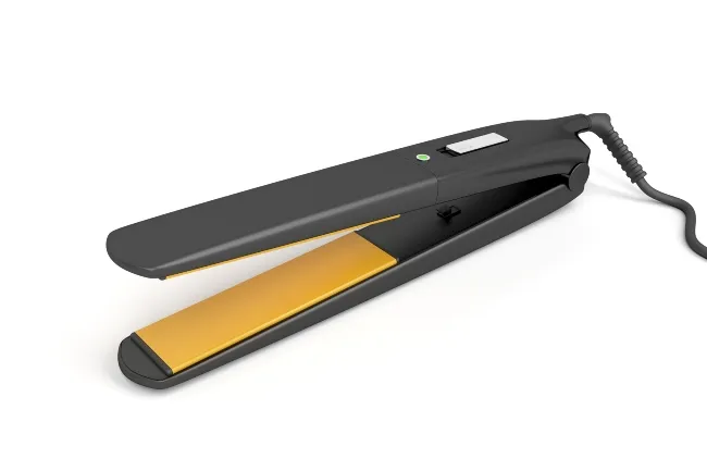 Black hair device with gold plates and a black cord coming out the end